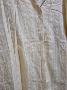Light Yellow V-Neck Button-Up Blouse
