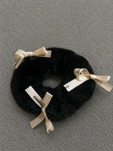 Fluffy Black Scrunchie with Bows