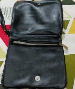 Chic Black Crossbody Bag with Floral Embroidery