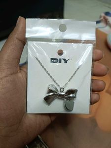 Silver Bow Pendant Necklace