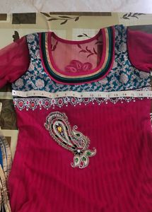 red suit with  black churidar and dupatta