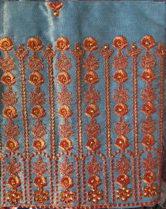 Elegant Embroidered Teal Saree