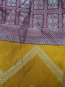 unstitched yellow banarsi suit