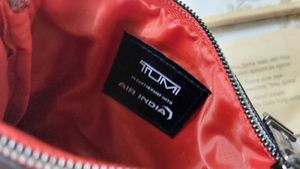 Tumi pouch andTravel Amenity Kit
