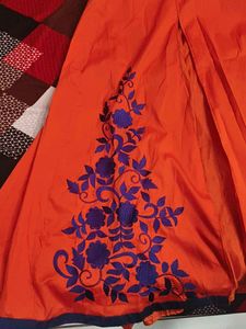 Orange Ethnic Gown with Blue Floral Embroidery