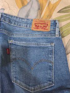 Distressed Blue Denim Jeans