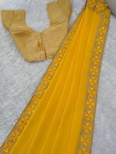 Bright Yellow Saree With Embellished Blouse
