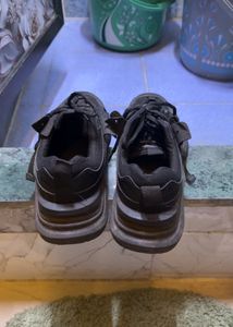 trending black sneakers