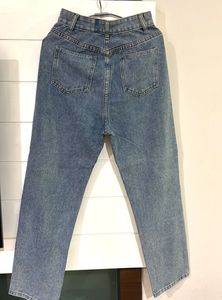Distressed Blue Denim Jeans