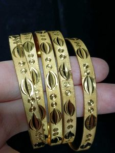 Set of 4 Gold Tone Bangles