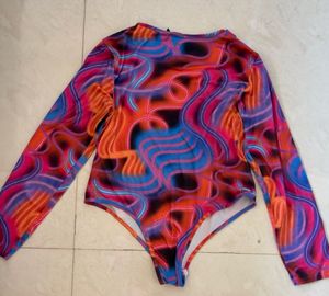 Vibrant Cut-Out Long Sleeve Top