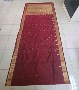Maroon kanchi pattu Saree with Meenakari/self jari