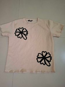 Cream Textured Top with Black Flower Applique