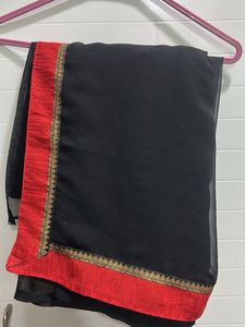 Elegant Black Saree with Red golden Border