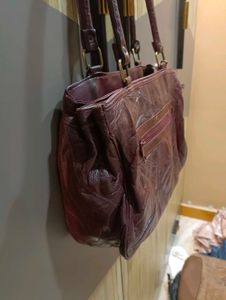 Chic Maroon Leather Handbag