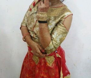 Golden Blouse With Red&amp;Mixed Orange Printed Lehnga