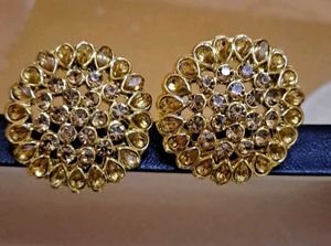 golden round studs