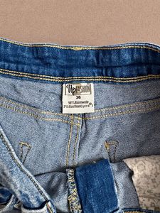 Distressed Denim Shorts with Lace Trim