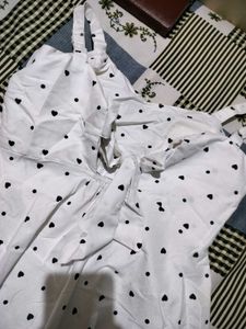a cute bow short dress I got it from sarojini mark