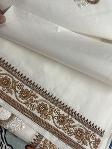 Brown Floral Bordered White Saree