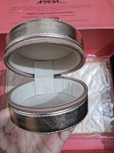 plum golden clutch with Tira trinket box