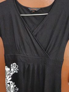 Chic Black Dress with White Lace Detail