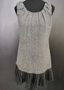 Chic Sleeveless Dress with Ruffled Hem