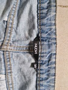 Light Wash Denim Cargo Mini Skirt