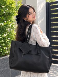 Chic Black Faux Leather Tote Bag with Pouch