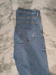 Ripped Knee Jeans