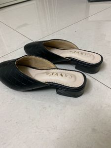 Black Mules Flats