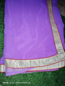 Beautiful Purple saree with Golden Border