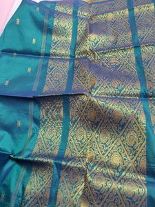 Elegant Teal Saree with Gold Border