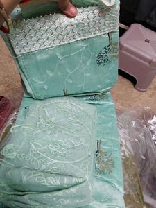 unstitched party wear suit with beautiful design