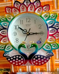 "Peacock Wall Clock: Elegant Modern Timepiece for Home Decor 🦚🕰️"