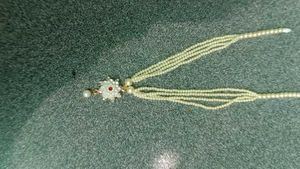 Elegant Pearl Necklace with Floral Pendant