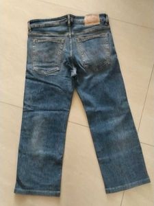 Distressed Blue Denim Jeans