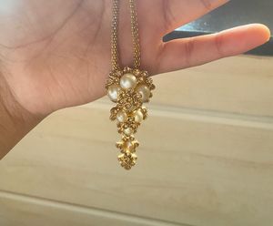Neckpiece, earrings, ring, chain