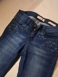 Women's Blue Flared Jeans with Embellishments