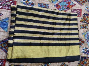 Elegant Black & Gold Striped Saree