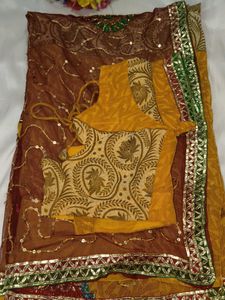 Embellished Brown Net Saree with blouse