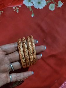 Set of 4 Intricately Carved Gold Bangles