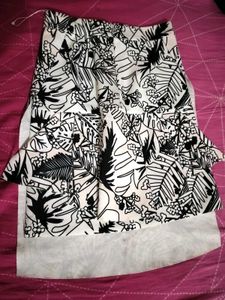 It is characterized by its bold black and white tr