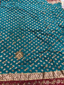 Stunning Teal Saree with Golden &amp; Red Border