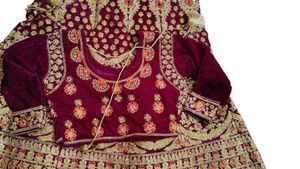 Stunning Maroon Embroidered Lehenga Choli