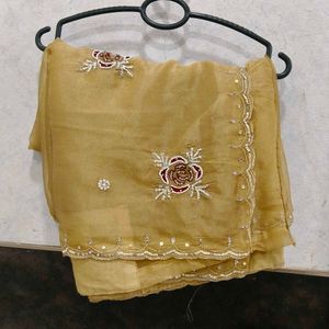 Elegant Golden Saree with Floral Embroidery