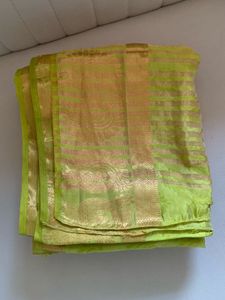 Vibrant Green Silk Saree with Gold Border