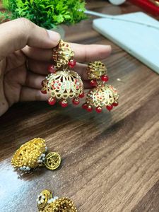 Elegant Jhumka Earrings with Red Beads