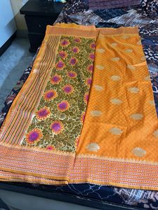 Beautiful Orange Saree with Floral Print