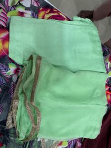 Elegant Mint Green Kurta with Embellished Neckline